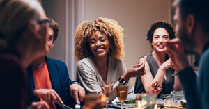 Group Of Friends Having Fun During A Dinner Celebration